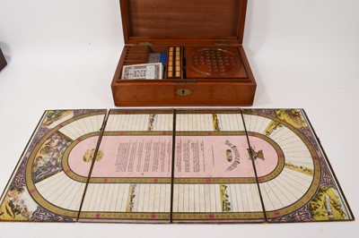 Lot 1179 - Edwardian mahogany games compendium with fitted interior comprising draughts, chess, backgammon, solitaire, dominoes, bezique, cribbage and classic steeplechase horse racing game