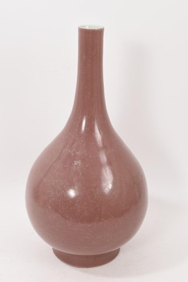 Lot 391 - Large Chinese monochrome peach bloom glazed bottle vase, six-character mark to base, probably 20th century, 42cm high