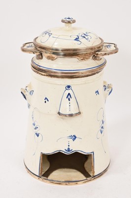 Lot 397 - French faience food warmer with silver mounts