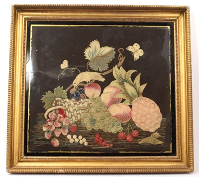 Lot 1154 - Georgian needlework stumpwork embroidered panel, depicting fruit and bird in verre églomisé frame.