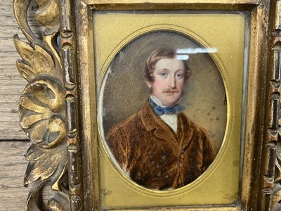 Lot 1157 - Mid 19th century English School portrait on ivory depicting Evan Lloyd, oval, in period frame