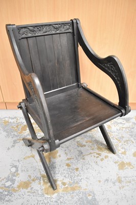 Lot 1726 - Victorian carved ebony Glastonbury chair