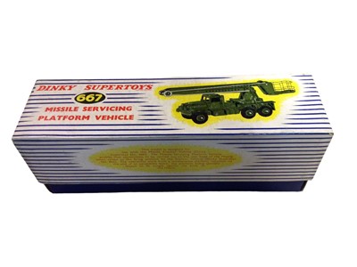 Lot 1859 - Dinky Supertoys Missile Erector Vehicle with Corporal Missile (fin missing) & Launching platform, No.666 & Missile Servicing Platform Vehicle, No.667, both boxed (2)