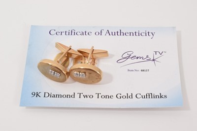 Lot 16 - Pair 9ct gold cufflinks each with an oval panel set with two brilliant cut diamonds, estimated to weigh 0.176cts in total. (Birmingham 2006), with Gems TV certificate