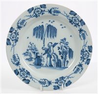 Lot 133 - 18th century English Delft plate painted in...