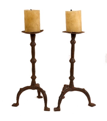 Lot Near pair of Flemish wrought iron tripod pricket candlesticks, possibly 16th / 17th century