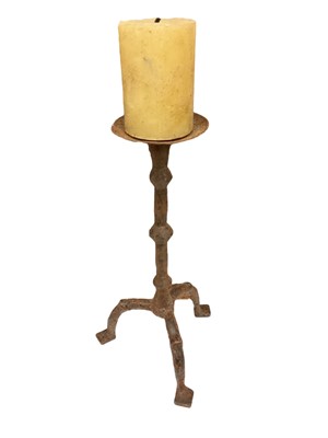 Lot 990 - Near pair of Flemish wrought iron tripod pricket candlesticks, possibly 16th / 17th century