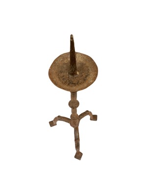 Lot 990 - Near pair of Flemish wrought iron tripod pricket candlesticks, possibly 16th / 17th century