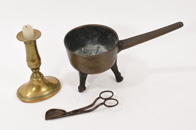 Lot 975 - Bronze skillet, brass ejector candlestick and steel wick trimmers