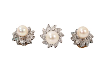 Lot 767 - Cultured pearl and diamond cocktail ring and matching earrings, each stylized flower with a cultured pearl surrounded by brilliant cut diamond petals in 18ct white g...