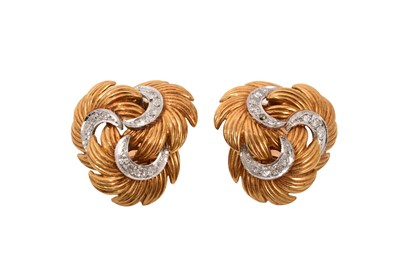 Lot 771 - Pair of gold and diamond earrings with stylized feathers and rose cut diamonds, with clip fittings, 27mm.