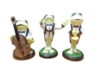 Lot 1129 - Three Lorna Bailey frog band members, tallest is 14.5cm