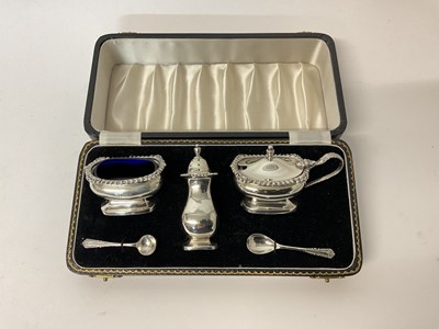 Lot 83 - Silver three piece cruet set in fitted box