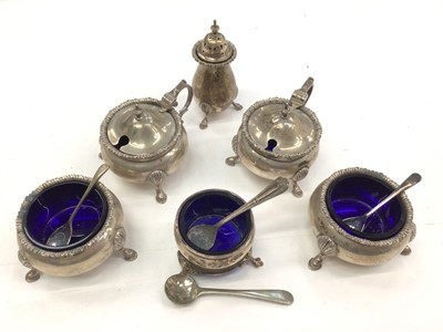 Lot 174 - 1920s five piece silver cruet set, together with an Edwardian silver salt and salt spoons