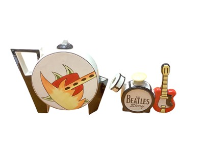 Lot 1152 - Lorna Bailey The Beatles drum kit teapot, 12,5cm high together with another teapot, 17.5cm high (2)