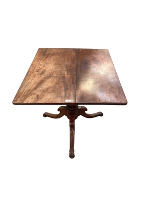 Lot 1732 - Georgian mahogany breakfast table, the rounded rectangular top on turned column and three splayed legs with fluted carved feet, 100cm x 76cm