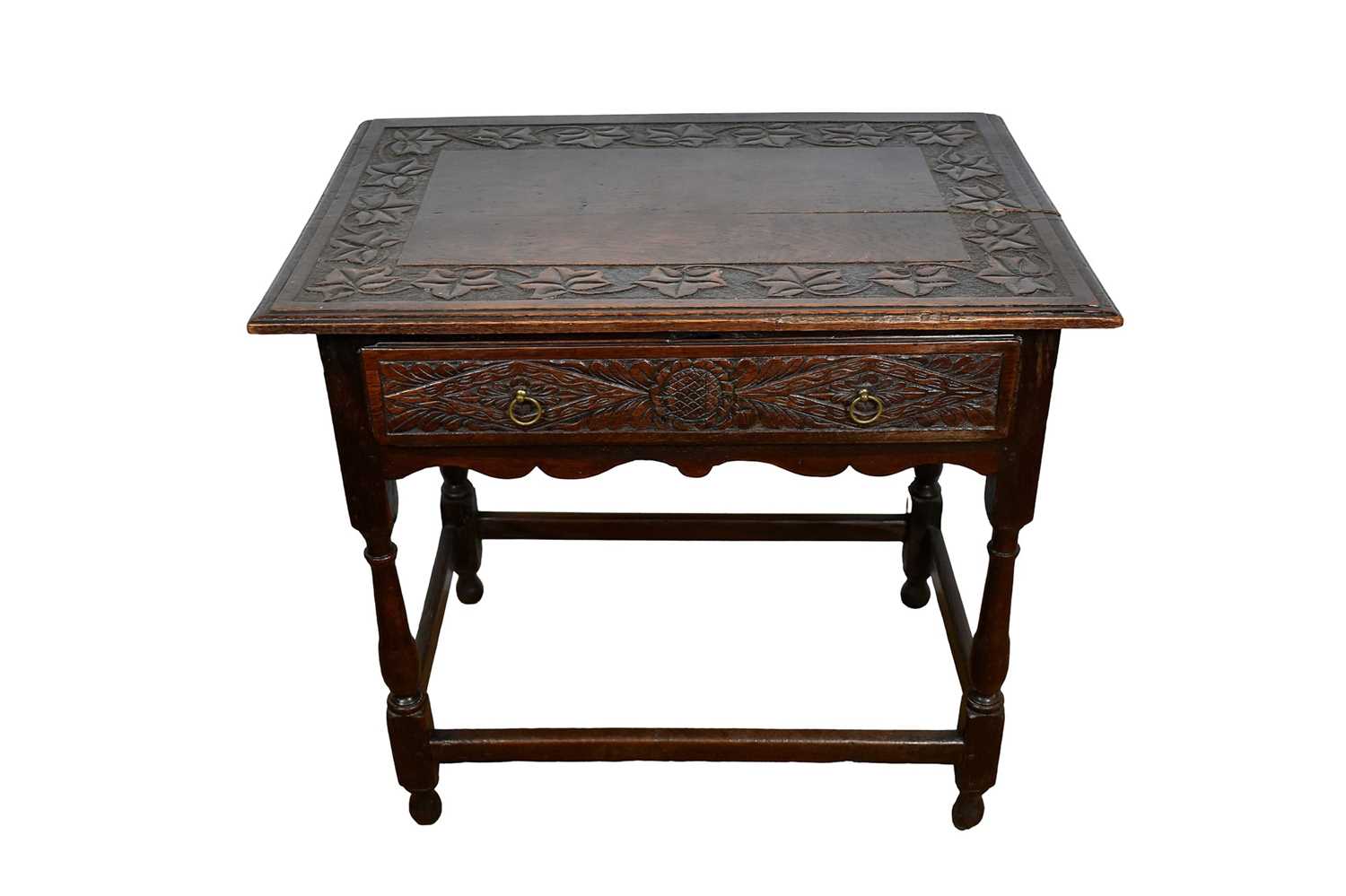 Lot 1534 - Late 17th century and later carved oak single drawer side table