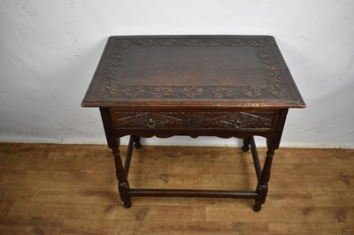 Lot 1534 - Late 17th century and later carved oak single drawer side table