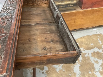 Lot 1534 - Late 17th century and later carved oak single drawer side table