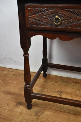 Lot 1534 - Late 17th century and later carved oak single drawer side table