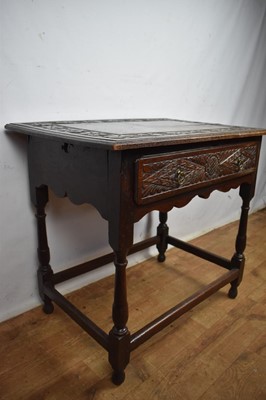 Lot 1534 - Late 17th century and later carved oak single drawer side table