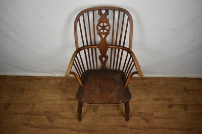 Lot Early 19th century yew, ash and elm wheel back Windsor chair