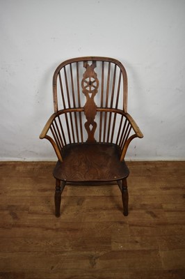 Lot Early 19th century yew, ash and elm wheel back Windsor chair