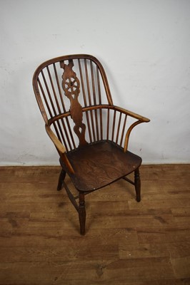 Lot Early 19th century yew, ash and elm wheel back Windsor chair