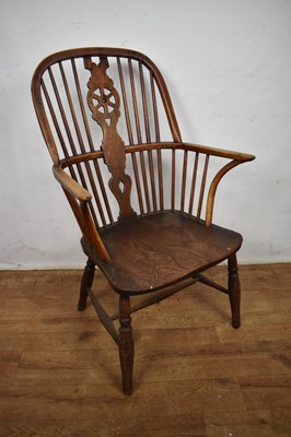 Lot Early 19th century yew, ash and elm wheel back Windsor chair