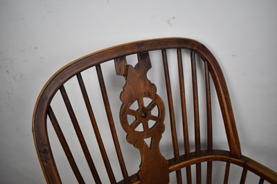 Lot Early 19th century yew, ash and elm wheel back Windsor chair