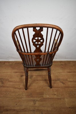 Lot Early 19th century yew, ash and elm wheel back Windsor chair