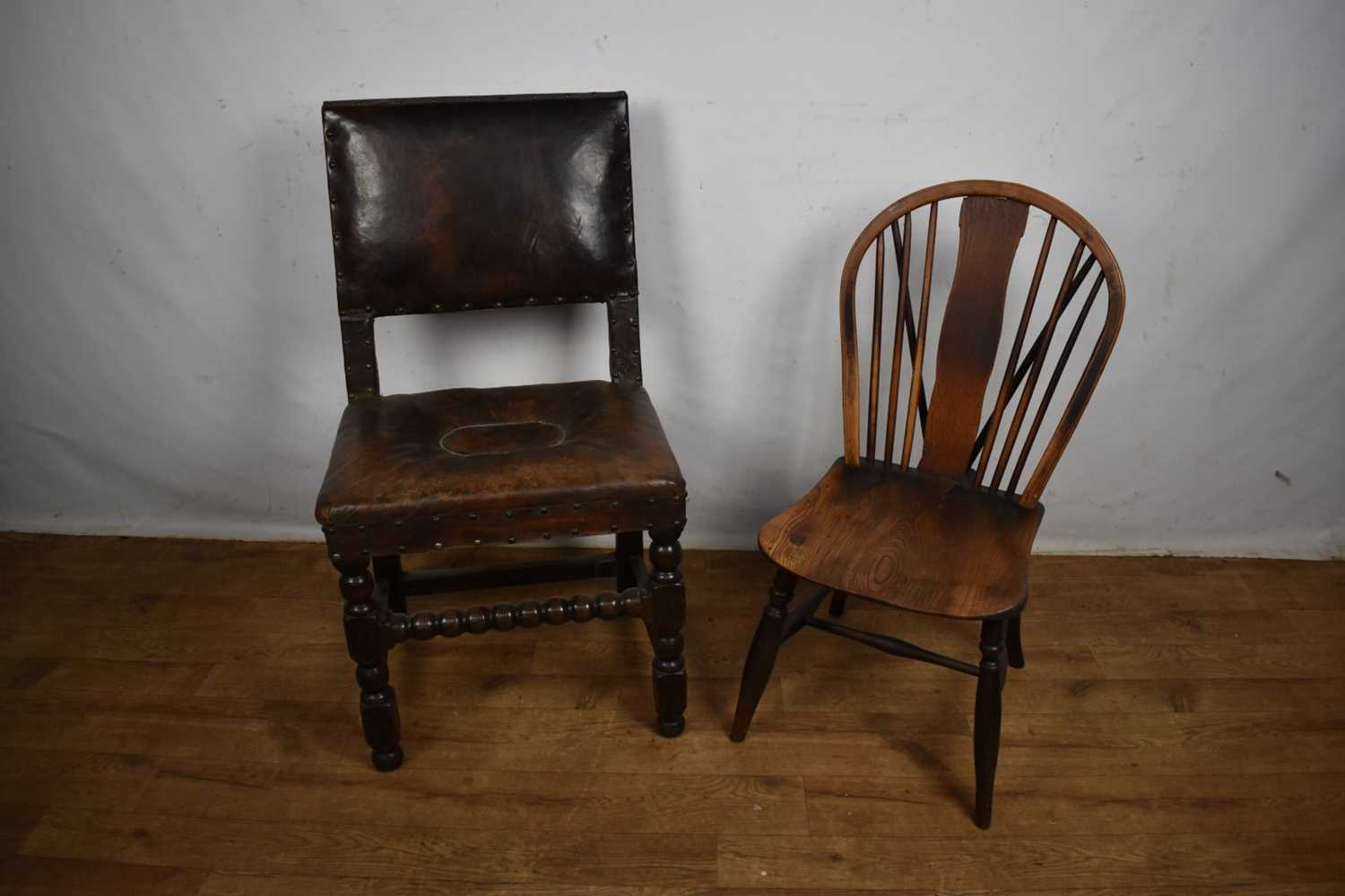 Lot Carolean leather upholstered oak side chair, together with an ash and elm Windsor chair