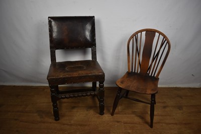 Lot Carolean leather upholstered oak side chair, together with an ash and elm Windsor chair