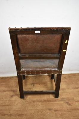 Lot Carolean leather upholstered oak side chair, together with an ash and elm Windsor chair