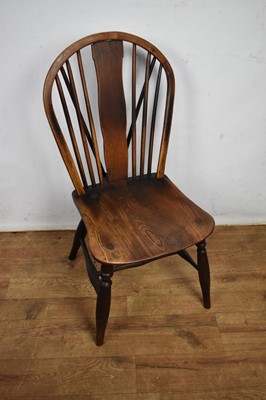 Lot Carolean leather upholstered oak side chair, together with an ash and elm Windsor chair