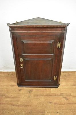 Lot George III oak corner cupboard