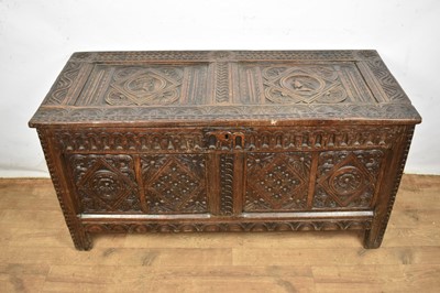 Lot 17th century and later carved oak coffer