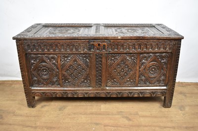 Lot 17th century and later carved oak coffer