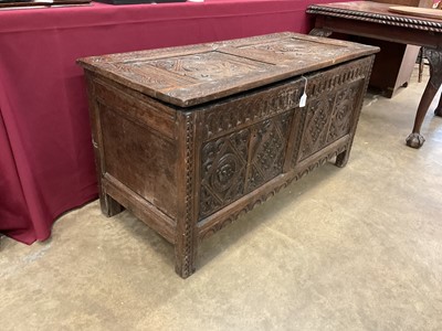 Lot 1539 - 17th century and later carved oak coffer