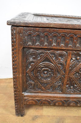 Lot 17th century and later carved oak coffer