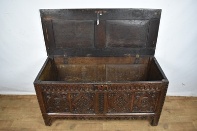 Lot 17th century and later carved oak coffer