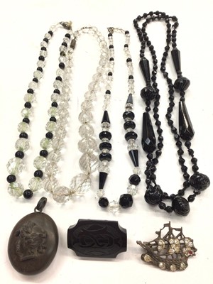 Lot 1104 - Victorian and later costume jewellery include glass bead necklaces, locket, jet brooch etc