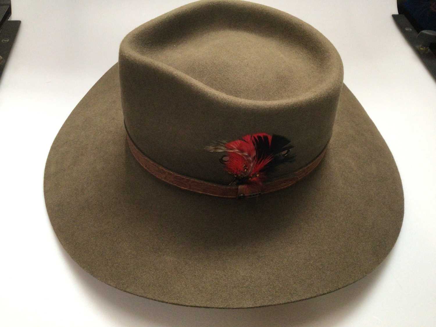 Lot 2165 - Two Australian fur felt hats, Akubra and Countrystyle both 59, as new, and a Panama straw hat size 7 1/4 (59).