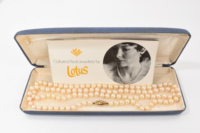 Lot 282 - 1970s cultured pearl single string necklace with a 9ct gold clasp set with seed pearls