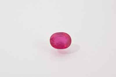 Lot 124 - Unmounted oval mixed cut ruby, weighing approximately 6.67cts (with certificate)