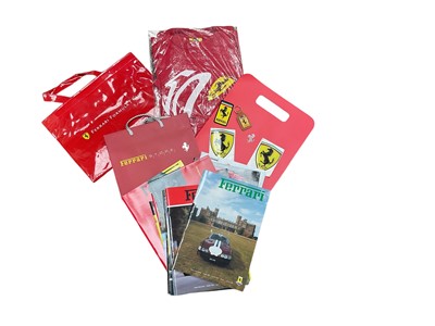 Lot 82 - Group of 1990s Ferrari ephemera to include magazines, road test reprints, together with Ferrari bags, key ring and t shirt (1 box).