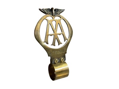 Lot 76 - Large brass AA badge, numbered 135294, 13.5cm in height (excluding mount).