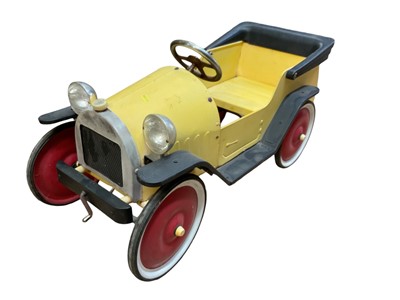 Lot 118 - Modern tin plate children's pedal car in the style of Brum, 94cm in overall length.