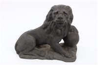 Lot 1050 - Early 19th century cast iron lion doorstop...