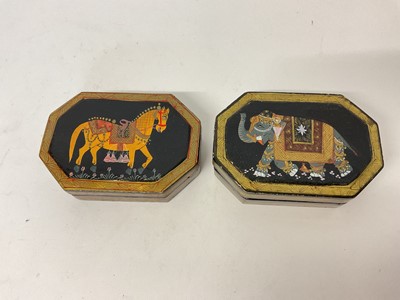 Lot 62 - Pair of decorative Indian papier mache boxes of elongated rectangular form decorated with an elephant and a horse, 11.5cm x 8cm